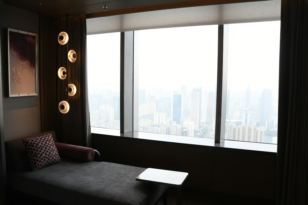 Modern office meeting room with large windows and city view